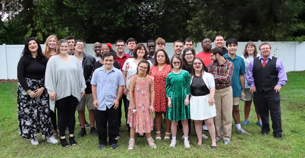 Focus Future participants and staff posing together outdoors for a group photo