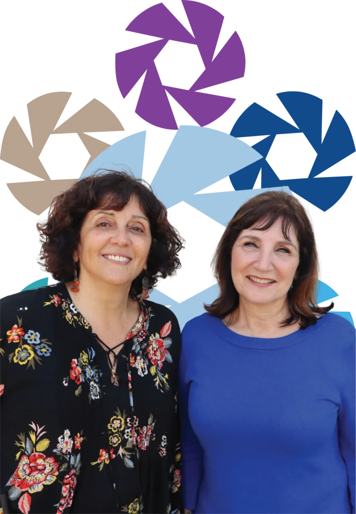 Two women smiling in front of a Project Focus graphic background.