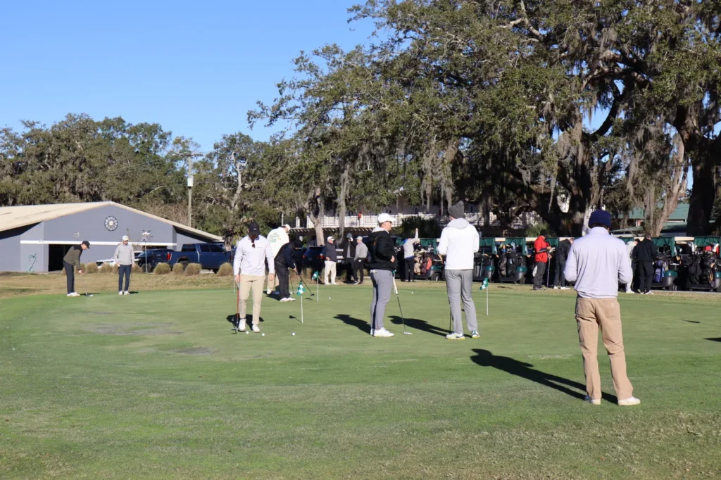 Players on the course under the oaks at Temple Terrace